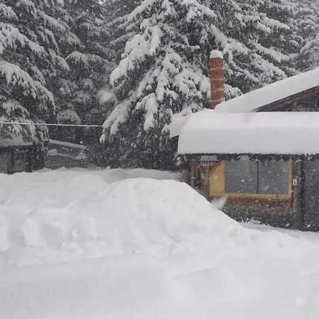 ловна в рила بيت خشبي